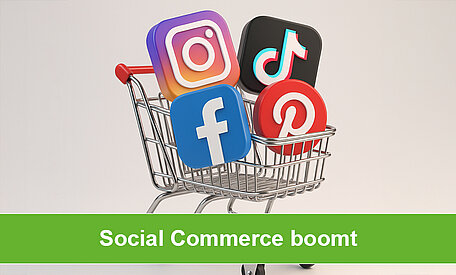 Einkaufswagen mit vier Social Media-Icons darin dazu eine grüne Bauchbinde: Social Commerce boomt