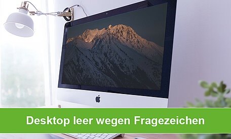 Ein PC-Monitor mit einem Hintergrundbild und leerem Desktop